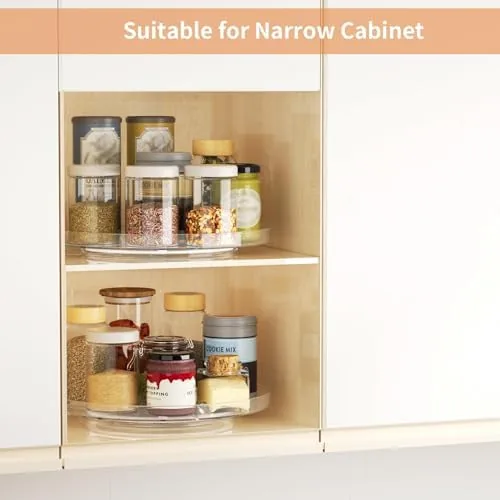 Clear lazy susan loaded with spice jars in a pantry cabinet
