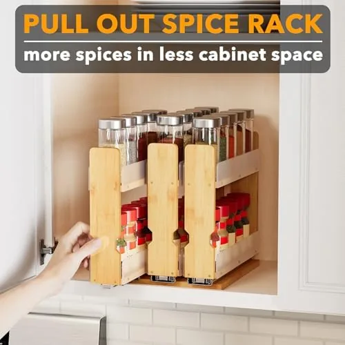 The pull out rack next to a lazy susan turntable and a countertop spice rack