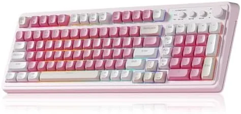 AULA 99 key pink wireless keyboard on a desk with the RGB backlight glowing