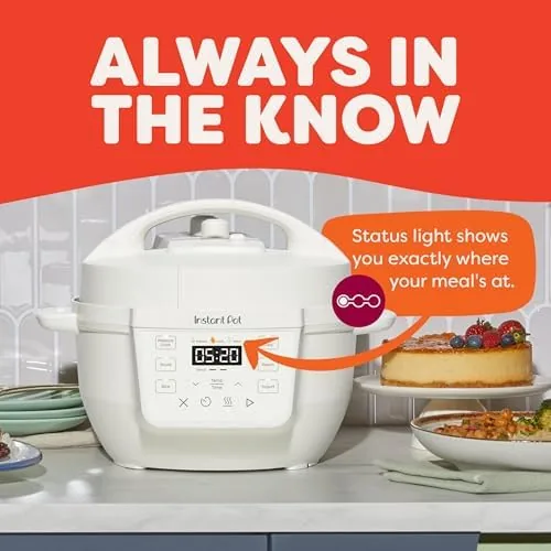 The RIO Mini with the lid open showing the stainless steel inner pot with rice inside