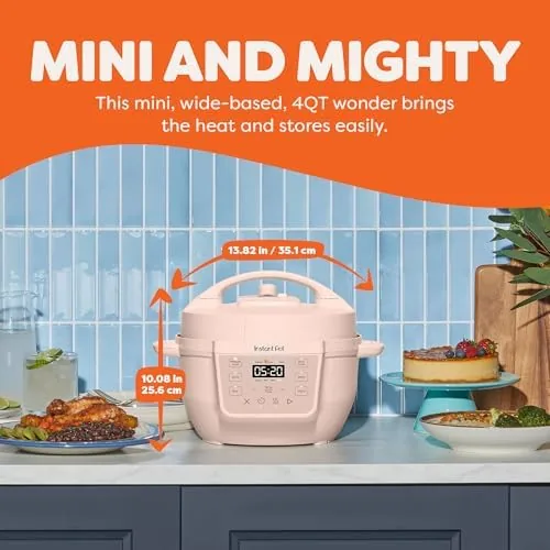 The RIO Mini with the lid open revealing steamed vegetables in the stainless steel pot