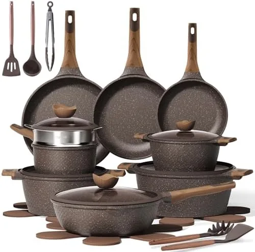 The CAROTE 26 piece nonstick cookware set arranged on a kitchen counter