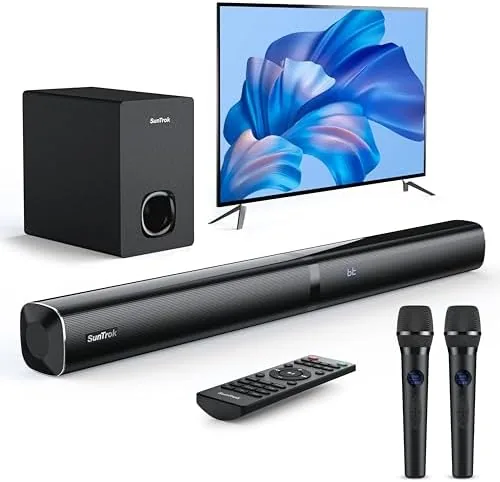 The soundbar with its wireless subwoofer set up in a living room