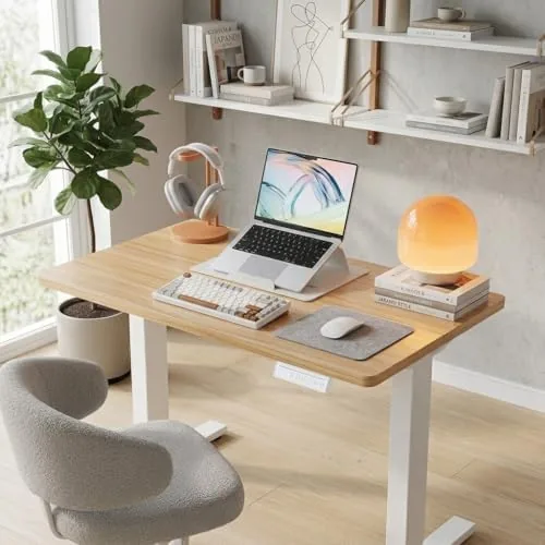Close up of the light walnut desktop with rounded corners