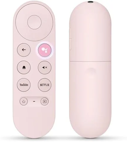 The pink replacement remote resting beside a Chromecast device