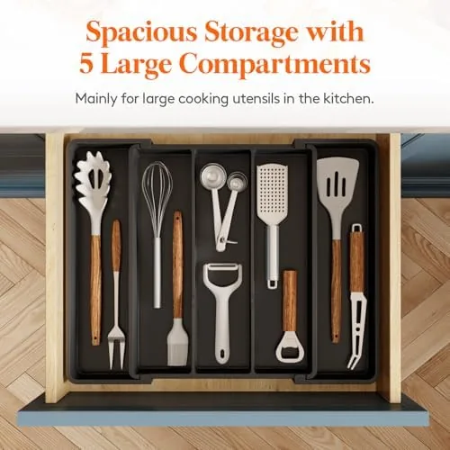 The organized drawer after sorting with each utensil in its own compartment