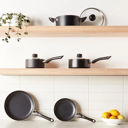 Eggs sliding out of an Amazon Basics ceramic frying pan without sticking