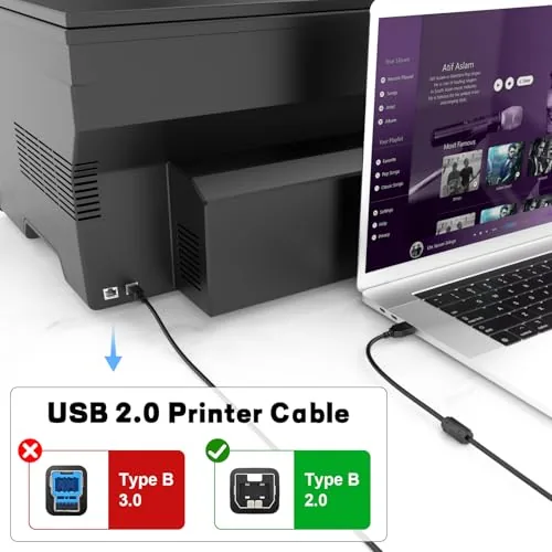 Coiled printer cable stored beside a printer