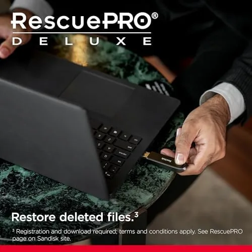 A photographer transferring photos with the SanDisk Extreme PRO