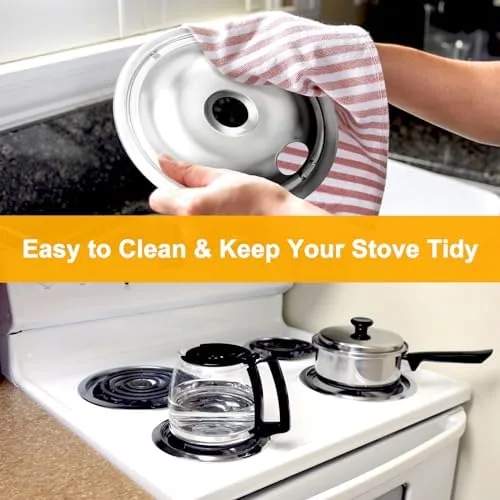 A chrome drip pan being wiped clean with a cloth