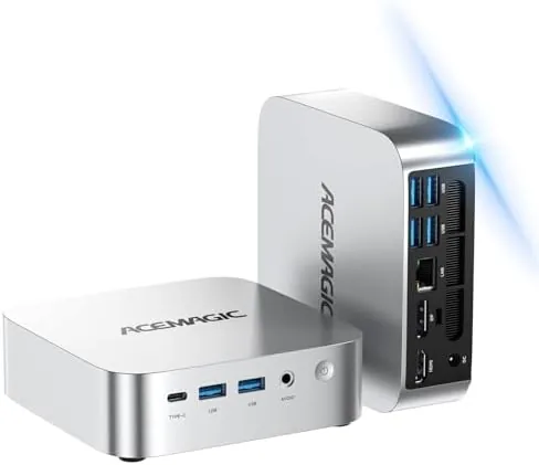 ACEMAGIC K1 mini PC sitting on a desk beside a monitor