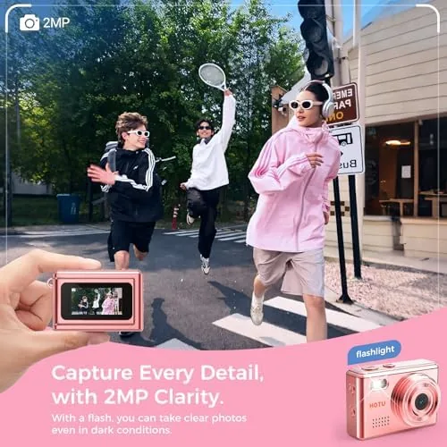 Camera clipped to a bag strap with the 8GB card nearby