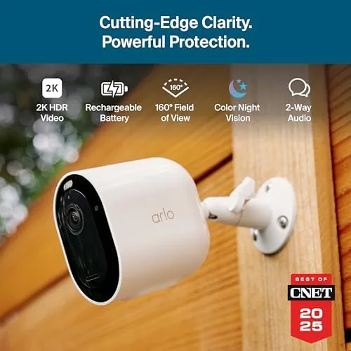 Two Arlo Pro cameras mounted on the front and back corners of a house