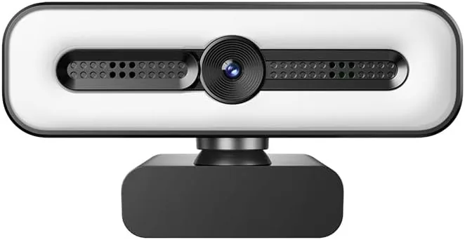 4K UHD ring light webcam mounted on a monitor above a desk