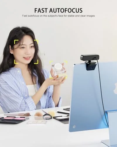 Ring light webcam in use during a video call on a home desk