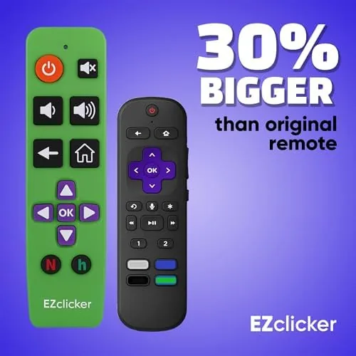 A hand pressing the large center button on the green EZclicker remote