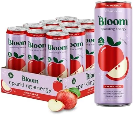 Two cans of Bloom sparkling energy drink in crisp apple flavor on a kitchen counter