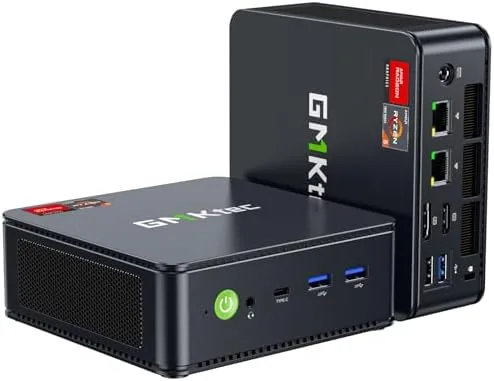 GMKtec M6 Ultra mini PC on a desk next to a monitor