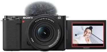 A still frame from vlog footage showing the camera user in sharp focus