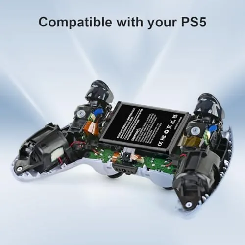 An opened DualSense controller showing the old battery being lifted out