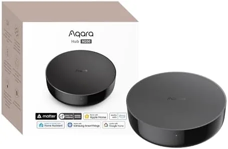 The Aqara Smart Hub M200 on a shelf with a status light glowing