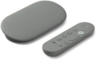 The Google TV Streamer 4K device in the Hazel finish beside its remote