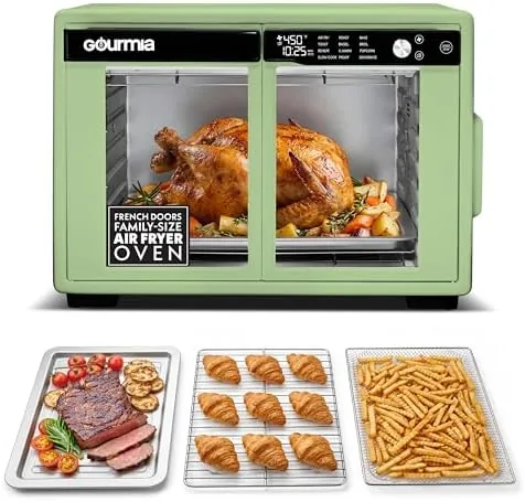The Gourmia French door air fryer oven open on a kitchen counter