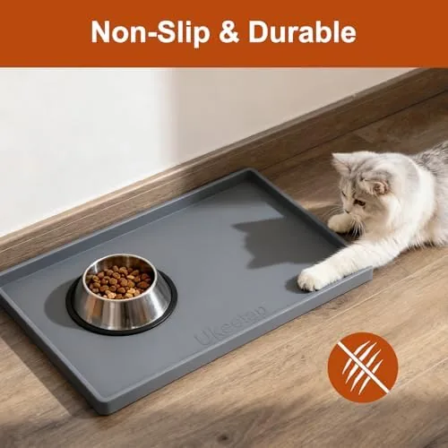 Cat drinking from a water bowl on the silicone feeding mat