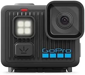 The GoPro LIT Hero action camera held in one hand outdoors