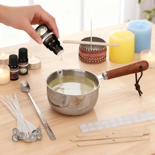 The stainless pour pot next to an enamel pourer and a measuring cup