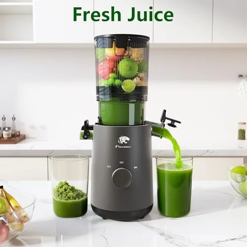 Glasses of green juice and pulp side by side on the counter