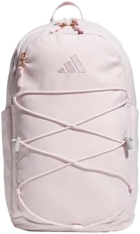 adidas Amplifier backpack in black standing on a desk with a laptop beside it