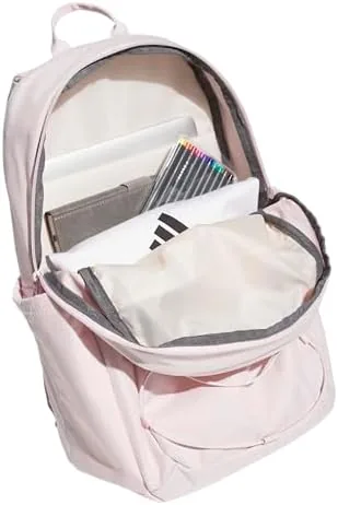 Side view of the backpack showing the water bottle pocket and padded straps