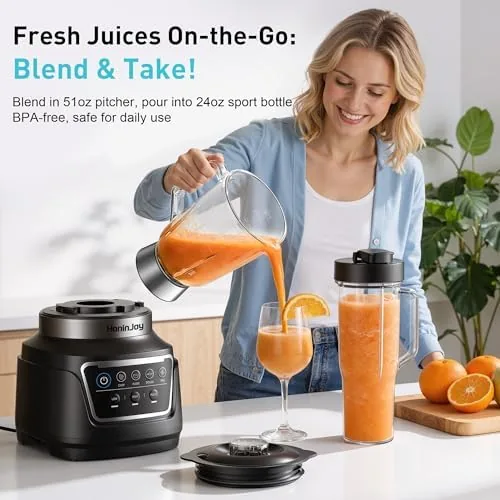 The all-in-one machine with its food processor bowl and slicing disc attached