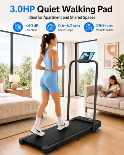 Cardirun walking pad folded upright against a wall next to a flat walking pad