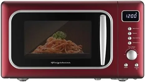 The Frigidaire retro microwave in red and silver on a kitchen counter