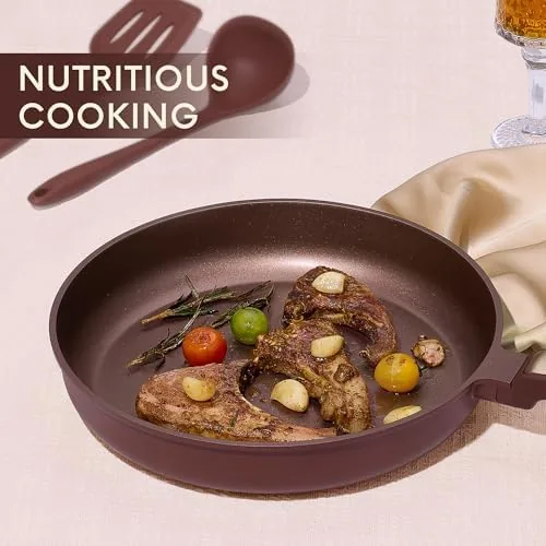 A finished dinner plated from a CAROTE pan on a kitchen table