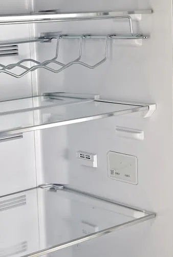 A temperature probe inside the refrigerator compartment during testing