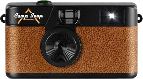 The Campsnap V105 compact digital camera in brown held in a hand