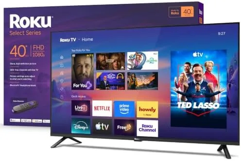 Roku 40 inch Select Series television on a bedroom media stand showing the home screen