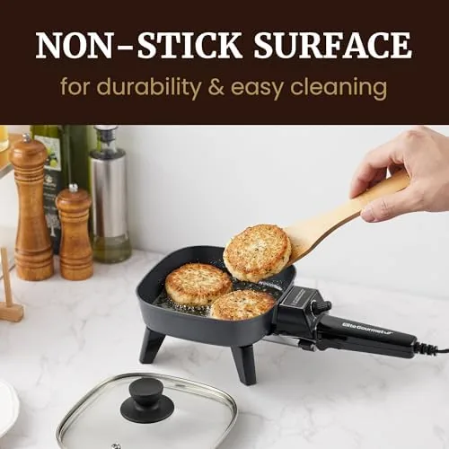 The Elite Gourmet skillet beside a large electric skillet and a hot plate