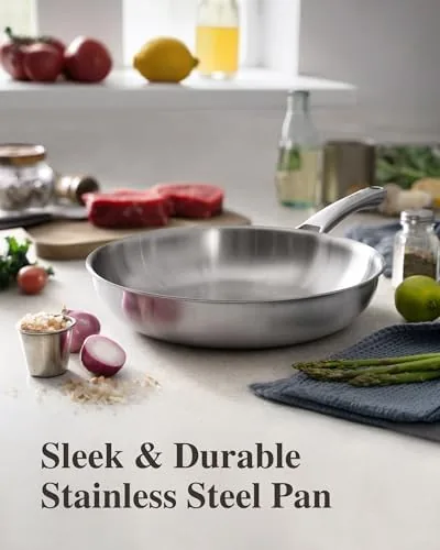 Close up of the tri-ply construction edge and riveted handle of the skillet