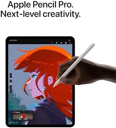 The 13-inch iPad Pro next to an ultraportable laptop
