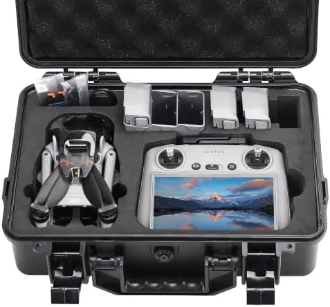 The black Mini 5 Pro hard case sitting closed on a table with a drone beside it