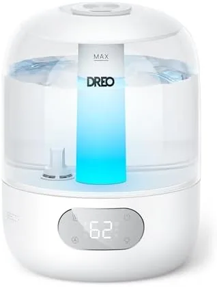 The white DREO 3L humidifier on a bedside table releasing a gentle mist