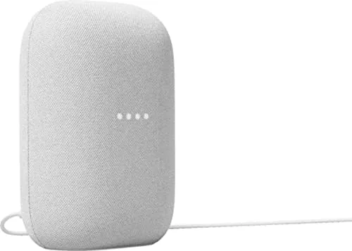 The Google Audio speaker showing the assistant light during a voice command