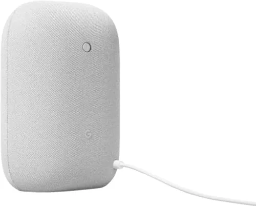 The Google Audio speaker controlling smart home lights in a living room