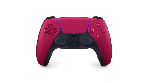 The DualSense Cosmic Red controller on a desk with a PS5 nearby