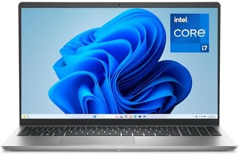 The Dell 15.6 inch laptop open on a desk in an office setting
