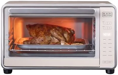 The BLACK+DECKER Crisp N Bake Pro air fry oven on a kitchen counter with the door open